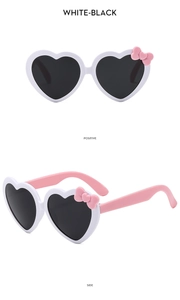 White heart sunglasses for girls with pink bow accent, positive and side view display