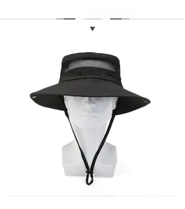 Close-up of black breathable outdoor sun hat with mesh vents and 'Outdoors' embroidery