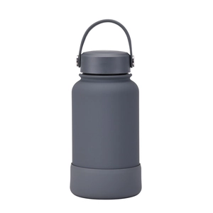 Detail showing the gray matte insulated water bottle with silicone protective base sleeve