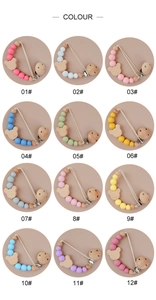 Selection of 12 colorful wooden bear pacifier clips with silicone beads for infants