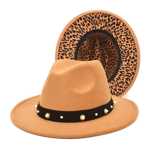 Detail of camel fedora hat featuring pearl studded band and leopard print lining