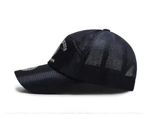 Detail of navy blue mesh baseball cap featuring white Walker embroidery and breathable fabric
