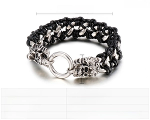 Close-up of black braided leather men's bracelet with steel tiger head and spring clasp