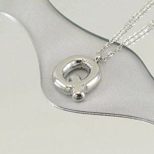 Fashionable silver stainless steel puffy bubble letter Q necklace with metallic luster