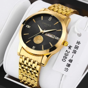 Details der ORUSS Uhr mit goldener Milanaise-Armband und Anzeige von Tag und Datum