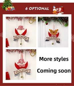 Detail of Christmas tree ornaments with cute plush figures and small golden bells