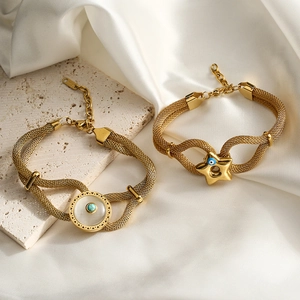 Gold mesh link bracelets with star and disk charms featuring turquoise and mother of pearl