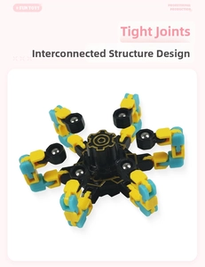 Close-up of flexible robotic spider fidget spinner with yellow mechanical link joints