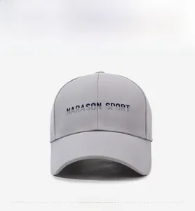 Close-up of Narason Sport gray baseball cap featuring premium navy 3D embroidery detail