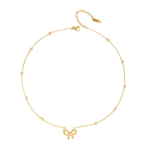 18K gold plated stainless steel bow necklace with beaded chain on white background