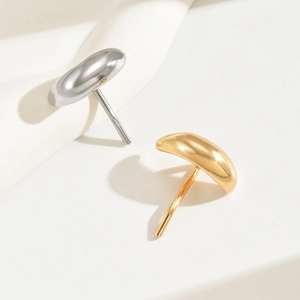 Minimalist curved bean-shaped metal hair hooks in elegant silver and gold finishes