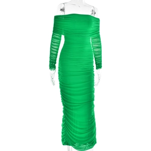 Detail of the green mesh fabric and ruched textures on this elegant off-shoulder dress