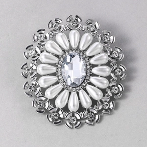 Elegant silver flower brooch with large crystal center and white teardrop pearls