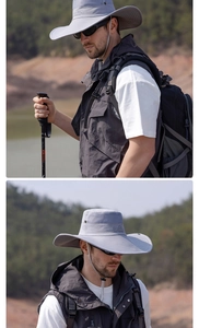 Detail of grey outdoor sun hat featuring breathable mesh top and adjustable chin strap