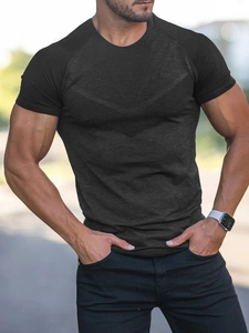 Detail of muscle fit sports t-shirt showing charcoal grey fabric texture and knit pattern