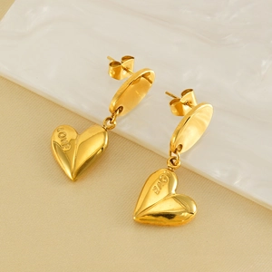 Vintage gold-plated heart drop earrings with LOVE engraving in minimalist style