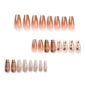 Orange gradient coffin fake nails with autumn maple leaf sequins and plaid designs