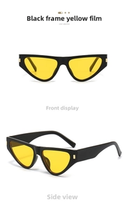 Detail view of cat eye sunglasses with black frame and yellow lenses from front and side