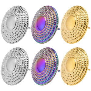 Detail view of round textured stud earrings in silver, gold and rainbow finishes
