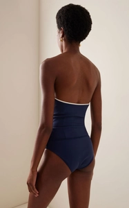 Rear view detail of navy blue high-elastic one-piece swimsuit with white trim accents