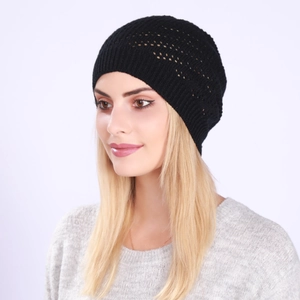 Detail of black knit beanie featuring a breathable hollow-out pattern on textured yarn