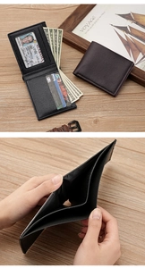Detail showing the internal multi-card slots and bill compartment of men's bifold wallet
