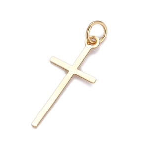 Detailed view of elegant gold-toned cross charm with metallic finish for DIY jewelry