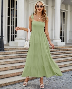 Full view of light green tiered maxi dress with ruched bodice and adjustable tie straps