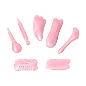 7-piece pink resin gua sha massage set for facial lifting and meridian scalp therapy
