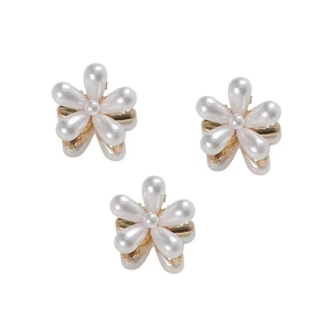 Three elegant gold-plated petal hair clips with white pearls in a floral pattern set