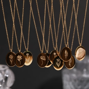 Golden stainless steel oval necklaces with 12 months floral patterns for women