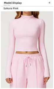 Detail of sakura pink tight yoga top with high collar and matching drawstring joggers