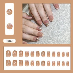 Short square press-on nails with French gradient, pink shimmer, and silver glitters