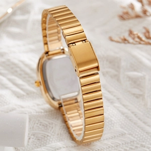 Elegant gold quartz watch for women with oval dial and metal link bracelet strap