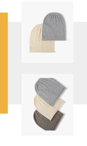 Macro detail of ribbed cuff and waffle knit texture on warm wool winter beanies