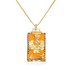 Detail of 18K gold plated tarot necklace with colorful zircon stones and Judgment pendant