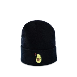 Close-up of the cartoon avocado embroidery on black ribbed knit winter beanie hat