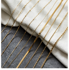Detailed selection of gold-plated titanium steel necklaces in various chain link styles