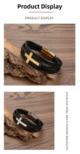 Close-up of multilayer braided leather bracelets with stainless steel cross charm and magnetic clasp