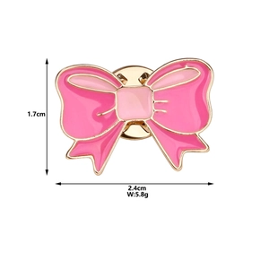 Pink enamel bow brooch details with size 2.4cm x 1.7cm and weight 5.8g measurements