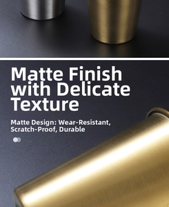 Detailed view of brushed stainless steel texture and rounded edge on the metal cup