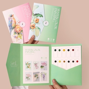Portable 12-color watercolor painting book with solid pigments and floral art designs