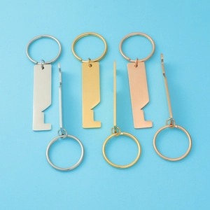 Stainless steel house-shaped keychain set in silver, gold, and rose gold with phone stand