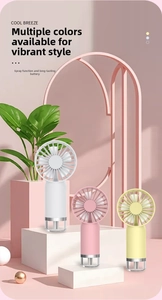 Detailed view of portable mini spray fans in white pink and yellow with mist function