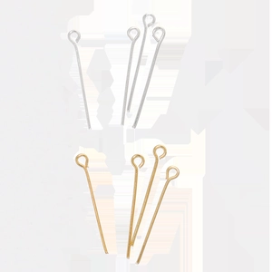 Detailed close-up of gold and silver eye pins for DIY jewelry making accessories set
