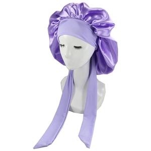 Detailed view of purple satin hair bonnet featuring wide elastic band and adjustable long straps
