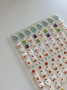 Détails d'autocollants 3D pour ongles avec Père Noël, bonhomme de neige et renne