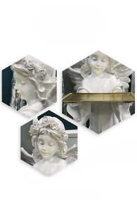 Close-up of elegant white resin angel figurine with a golden storage tray for entryway
