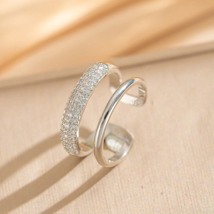 Macro detail of silver double-layered open ring with micro-pave cubic zirconia stones