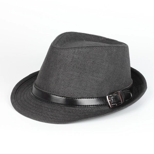 Macro detail of breathable black straw fedora featuring a leather strap and silver buckle